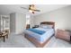 A well-lit bedroom with a ceiling fan and a calming color palette at 3331 Daniel St, Mooresville, IN 46158