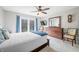 Bedroom with a large window, wood floors, and a comfortable bed at 3331 Daniel St, Mooresville, IN 46158