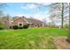 Well-maintained brick home with a lush green lawn, showcasing its classic charm and inviting curb appeal at 3331 Daniel St, Mooresville, IN 46158
