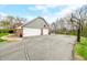 Spacious three-car garage with a basketball hoop on the driveway, great for Gathering fun at 3331 Daniel St, Mooresville, IN 46158