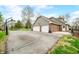 Spacious three-car garage with a basketball hoop and ample driveway space, offering plenty of parking at 3331 Daniel St, Mooresville, IN 46158