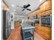 Spacious kitchen with stainless steel appliances, custom cabinets, and center island, perfect for cooking and entertaining at 3331 Daniel St, Mooresville, IN 46158
