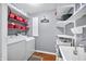 Well-organized laundry room with shelving, washer, and dryer, perfect for efficient home management at 3331 Daniel St, Mooresville, IN 46158