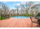 Inviting in-ground pool with a surrounding deck, perfect for outdoor relaxation at 3331 Daniel St, Mooresville, IN 46158