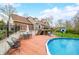 Inviting backyard featuring a refreshing swimming pool and an expansive wooden deck, perfect for summer gatherings at 3331 Daniel St, Mooresville, IN 46158
