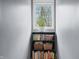 Charming reading nook features a bookshelf filled with books and a bright window at 3331 Daniel St, Mooresville, IN 46158