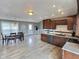 Bright, open concept kitchen featuring modern stainless steel appliances and light-colored wood flooring at 3703 E Gore St, Columbus, IN 47201