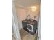 Convenient laundry room featuring a gray front load washer and dryer at 3703 E Gore St, Columbus, IN 47201