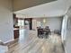 Bright and airy living space featuring hardwood floors, modern lighting, and an open floor plan at 3703 E Gore St, Columbus, IN 47201