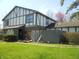 Charming Tudor-style home with a combination of brick and siding facade at 3744 Tudor Park Dr # 2, Indianapolis, IN 46235