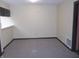 A room with neutral walls and carpet, offering a blank canvas for customization at 3744 Tudor Park Dr # 2, Indianapolis, IN 46235