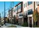 Charming townhomes showcasing brick and modern designs with manicured landscaping at 380 S Meridian St, Greenwood, IN 46142