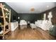 Spacious living room with hardwood floors, contemporary decor, and large windows at 3896 Woods Bay Ln, Plainfield, IN 46168