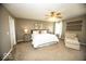 Spacious main bedroom featuring neutral decor, a ceiling fan, and ample natural light at 3896 Woods Bay Ln, Plainfield, IN 46168