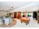 Finished basement with kitchenette, billiard table, and entertainment area at 4052 Diamond Row, Greenwood, IN 46143