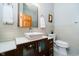 Modern bathroom featuring a vessel sink, stylish vanity, and neutral toned tile at 4052 Diamond Row, Greenwood, IN 46143