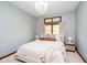 Cozy bedroom with a soft color palette and a large window offering lots of natural light at 4052 Diamond Row, Greenwood, IN 46143