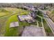 Community pool, playground, and parking area in a well-maintained neighborhood with green spaces at 4052 Diamond Row, Greenwood, IN 46143