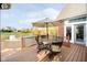 Outdoor dining set with view of the pond and fountain, accessible from the dining room at 4052 Diamond Row, Greenwood, IN 46143