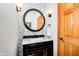 Stylish powder room with modern vanity, decorative mirror, and elegant fixtures at 4052 Diamond Row, Greenwood, IN 46143