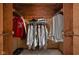 Well-organized walk-in closet with clothes hanging, shelving, and shoe storage at 426 Oakwood Dr, Indianapolis, IN 46260