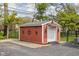 Charming backyard storage shed with unique design and ample space at 426 Oakwood Dr, Indianapolis, IN 46260