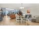 Bright dining area adjacent to the living room with modern décor and ample seating at 43 Dominion Dr, Zionsville, IN 46077