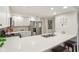 The kitchen showcases stainless steel appliances, white cabinets, and a breakfast bar at 43 Dominion Dr, Zionsville, IN 46077