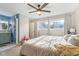 Bright and spacious bedroom with an ensuite bathroom, large windows, and modern fixtures at 43 Dominion Dr, Zionsville, IN 46077
