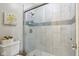 Glass shower is complete with bright tile, shower accessories, and modern fixtures at 43 Dominion Dr, Zionsville, IN 46077