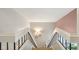 A well-lit staircase with modern railings leads to the upper level at 43 Dominion Dr, Zionsville, IN 46077
