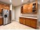 Well-equipped kitchen featuring stainless steel appliances, extensive wood cabinetry and an open layout for easy entertaining at 4327 Switchgrass Way, Indianapolis, IN 46237