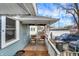 Charming backyard deck with bistro seating and string lights, perfect for relaxing at 433 Eastern Ave, Indianapolis, IN 46201