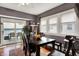 Inviting dining room with hardwood floors, large windows, and a cozy ambiance at 433 Eastern Ave, Indianapolis, IN 46201