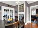 Dining room with hardwood floors, built in cabinet and natural light at 433 Eastern Ave, Indianapolis, IN 46201