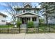 Charming two-story home with a well-maintained lawn and welcoming front porch at 433 Eastern Ave, Indianapolis, IN 46201