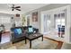 Comfortable living room featuring french doors and ample seating at 433 Eastern Ave, Indianapolis, IN 46201
