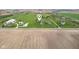 Scenic aerial view of a home on a large lot, surrounded by farmland at 4634 E 1000 N, Pittsboro, IN 46167