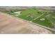 Aerial view displaying several homes on large lots and farmland at 4634 E 1000 N, Pittsboro, IN 46167