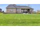 Expansive backyard with a patio and firepit, perfect for outdoor gatherings at 4634 E 1000 N, Pittsboro, IN 46167