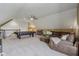 Spacious bonus room with comfortable seating and an area for recreation at 4634 E 1000 N, Pittsboro, IN 46167