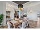 Dining room featuring an open floor plan with modern light fixtures at 4634 E 1000 N, Pittsboro, IN 46167