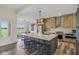 Gourmet kitchen with large center island, stainless steel appliances, and custom cabinetry at 4634 E 1000 N, Pittsboro, IN 46167