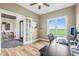 Bright home office with a large window overlooking the lawn, providing a serene work environment at 4634 E 1000 N, Pittsboro, IN 46167