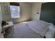 Inviting bedroom with ample natural light, featuring soft decor and a calming color scheme at 4810 Oak Hl Dr, Lebanon, IN 46052