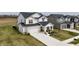 A beautiful two-story home boasts a large driveway, attached two-car garage and well-manicured lawn at 4810 Oak Hl Dr, Lebanon, IN 46052