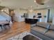 Open-concept living area with hardwood floors, island kitchen, and a spacious living room with modern decor at 4810 Oak Hl Dr, Lebanon, IN 46052