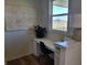 Bright office nook with a large window, stylish decor, and a functional workspace at 4810 Oak Hl Dr, Lebanon, IN 46052