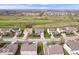 Aerial view of homes in a well-maintained neighborhood with a golf course in the background at 4922 Birmingham Dr, Indianapolis, IN 46235