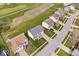 Aerial view of a home showcasing its location and surrounding residential neighborhood, close to a golf course at 4922 Birmingham Dr, Indianapolis, IN 46235